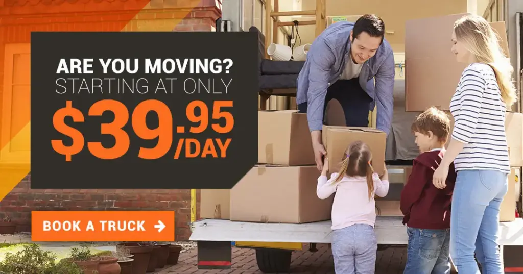 Moving as a family holding boxes