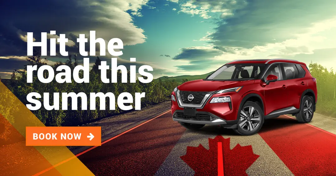 Canada Day flag and red car nissan rogue