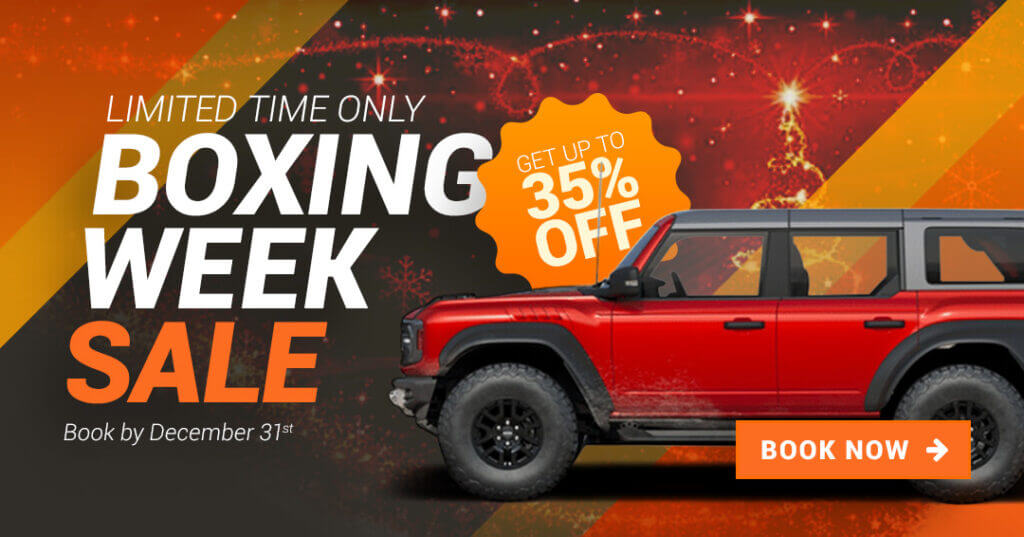 Boxing Day offers, red jeep wrangler in a festive setting