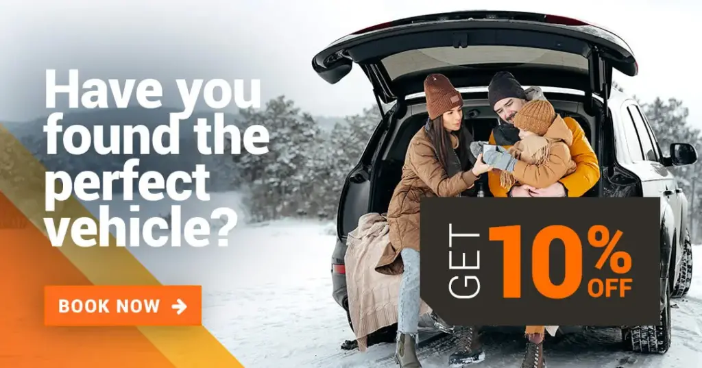 family in car winter time